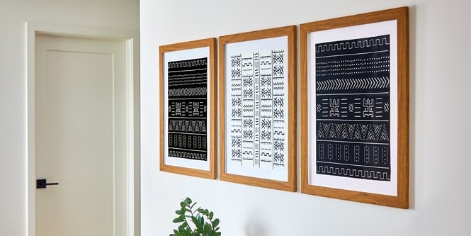 使用無痕高承重相/畫框掛扣掛起大型畫框
