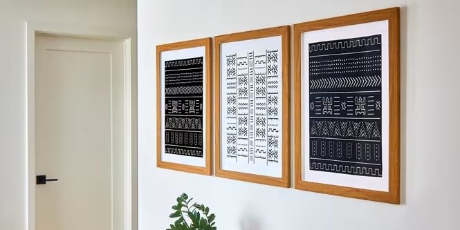 使用無痕高承重相/畫框掛扣掛起大型畫框
