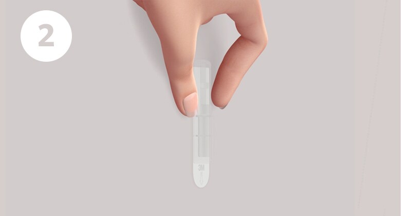 3M掛鉤拆除 Step 2: 輕扶無痕™ 掛鉤或背板
